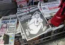 Charlie Hebdo blasted for migrant cartoon – again
