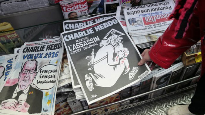 Charlie Hebdo blasted for migrant cartoon – again Charlie Hebdo blasted for migrant cartoon – again