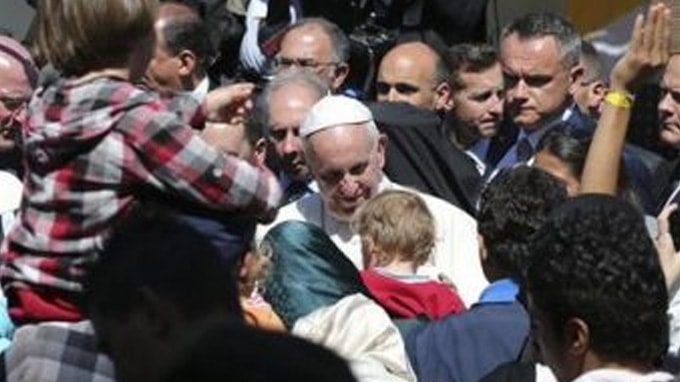 Pope teaches world a lesson–brings 12 refugees to the Vatican