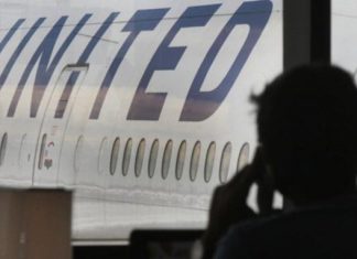WATCH: Man forcibly removed from overbooked United flight